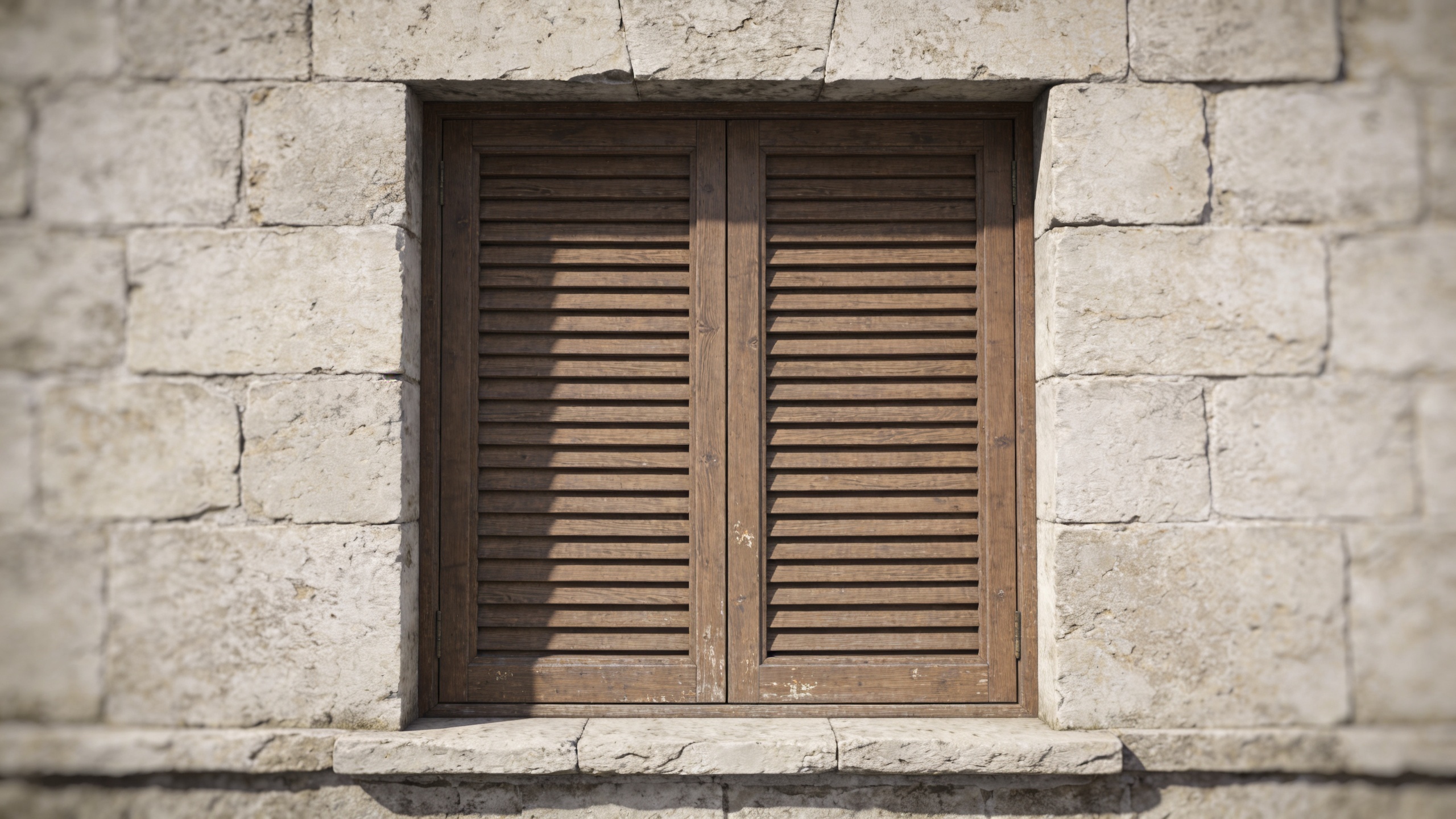 vieille facade en pierre avec grands volets bois fermes